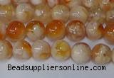 CAA1071 15.5 inches 6mm round sakura agate gemstone beads