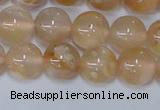 CAA1073 15.5 inches 10mm round sakura agate gemstone beads