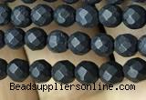 CAA2437 15.5 inches 4mm faceted round matte black agate beads