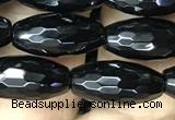 CAA2500 15.5 inches 6*16mm faceted rice black agate beads wholesale