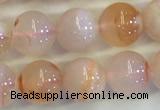 CAA3643 15.5 inches 6mm round sakura agate beads wholesale