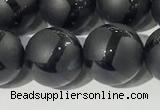 CAA3657 15.5 inches 10mm round matte & carved black agate beads