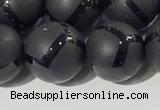 CAA3658 15.5 inches 12mm round matte & carved black agate beads