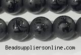 CAA3675 15.5 inches 6mm round matte & carved black agate beads