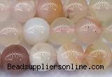 CAA5913 15 inches 6mm round sakura agate gemstone beads