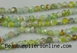 CAA707 15.5 inches 4mm faceted round fire crackle agate beads