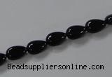 CAB744 15.5 inches 6*8mm flat teardrop black agate gemstone beads