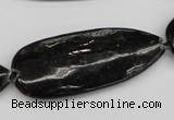 CAE72 15.5 inches 18*44mm flat teardrop astrophyllite beads wholesale