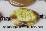 CAG1578 15.5 inches 20*30mm twisted oval fire crackle agate beads