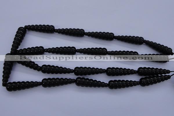 CAG1697 15.5 inches 10*35mm carved teardrop black agate beads