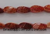 CAG4181 15.5 inches 7*14mm faceted & twisted rice natural fire agate beads