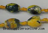 CAG5774 15 inches 10*14mm faceted rice fire crackle agate beads