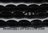 CAG6029 15.5 inches 6*10mm faceted rice matte black agate beads