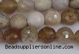 CAG9854 15.5 inches 8mm faceted round ocean fossil agate beads