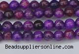 CAG9917 15.5 inches 4mm round purple crazy lace agate beads