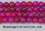 CAG9924 15.5 inches 4mm round fuchsia crazy lace agate beads