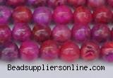 CAG9925 15.5 inches 6mm round fuchsia crazy lace agate beads