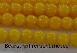 CAR401 15.5 inches 6mm round synthetic amber beads wholesale