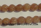 CBQ15 15.5 inches 10mm carved round strawberry quartz beads wholesale