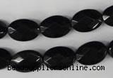 CBS310 15.5 inches 10*14mm faceted oval blackstone beads wholesale