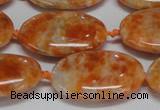 CCA484 15.5 inches 18*25mm oval orange calcite gemstone beads