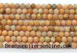 CCA551 15.5 inches 6mm round peach calcite gemstone beads