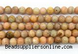 CCA553 15.5 inches 10mm round peach calcite gemstone beads