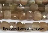 CCU1012 15 inches 4mm faceted cube sunstone beads