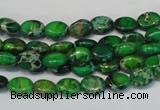 CDI178 15.5 inches 6*8mm oval dyed imperial jasper beads