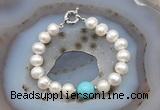 CFB1016 Hand-knotted 9mm - 10mm potato white freshwater pearl & blue howlite bracelet