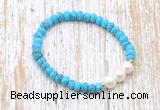 CFB704 faceted rondelle turquoise & potato white freshwater pearl stretchy bracelet