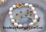 CFB904 Hand-knotted 9mm - 10mm rice white freshwater pearl & lavender amethyst bracelet