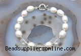 CFB908 Hand-knotted 9mm - 10mm rice white freshwater pearl & white crystal bracelet