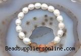 CFB913 9mm - 10mm rice white freshwater pearl & rainbow moonstone stretchy bracelet