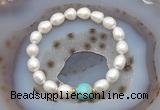 CFB926 9mm - 10mm rice white freshwater pearl & blue sea sediment jasper stretchy bracelet