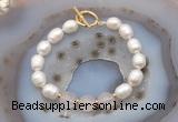 CFB934 Hand-knotted 9mm - 10mm rice white freshwater pearl & rose quartz bracelet