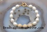 CFB946 Hand-knotted 9mm - 10mm rice white freshwater pearl & white fossil jasper bracelet