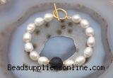 CFB978 Hand-knotted 9mm - 10mm rice white freshwater pearl & black lava bracelet