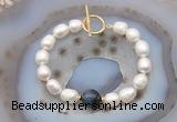 CFB979 Hand-knotted 9mm - 10mm rice white freshwater pearl & blue tiger eye bracelet