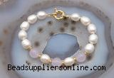 CFB985 Hand-knotted 9mm - 10mm rice white freshwater pearl & candy jade bracelet