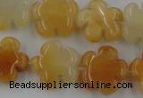 CFG1000 15.5 inches 16mm carved flower yellow jade beads