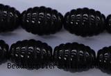 CFG759 15.5 inches 15*20mm carved rice black agate beads