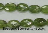 CGA101 15.5 inches 10*14mm faceted oval natural green garnet beads