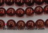 CGA602 15.5 inches 8mm A grade round natural orange garnet beads