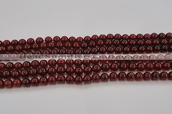 CGA608 15.5 inches 7mm AA grade round natural orange garnet beads