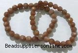 CGB4065 7.5 inches 7mm round sunstone beaded bracelets