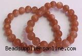 CGB4539 7.5 inches 9mm round golden sunstone beaded bracelets