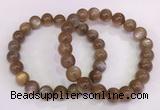 CGB4549 7.5 inches 9mm - 10mm round sunstone beaded bracelets