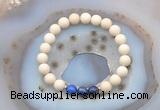 CGB6465 8mm round matte white fossil jasper & lapis lazuli beaded bracelets