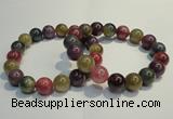 CGB651 7.5 inches 10.5mm - 11mm round natural ruby sapphire bracelet